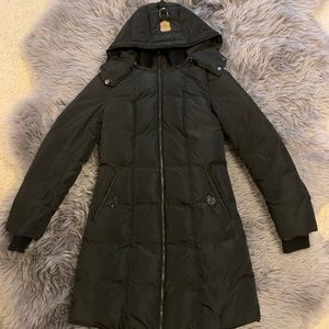 Black Mackage down jacket with leather details and removable hood.